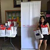 Christine quick photo op before distributing the gift bags